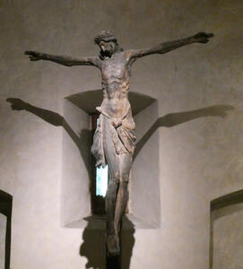 Christ on cross; cross is barely visible.