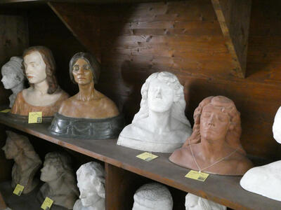 Busts of several women