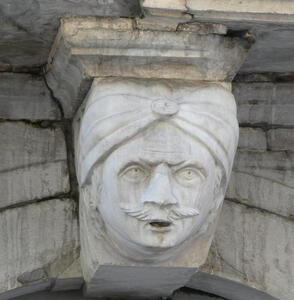 Sculpture of head of a man with moustache and turban