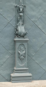 Elaborate scrollwork at bottom of door