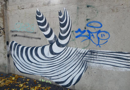 Abstract curved zebra-striping on wall