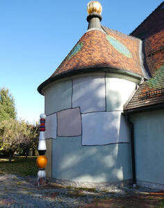 Wall of church, painted with large, irregular rectangles.