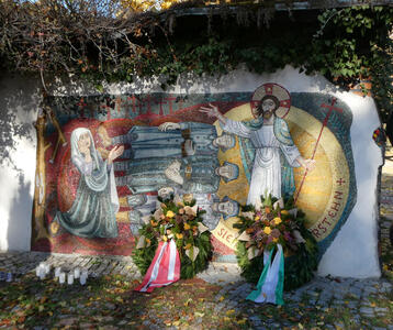 Mosaic of Jesus and Mary, with three dead soldiers in WWII uniforms.