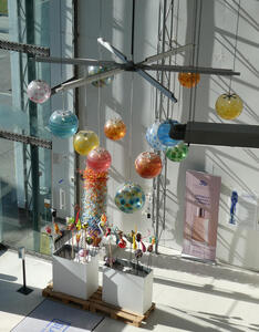 Multicolored glass spheres hanging from ceiling