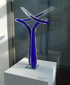 Cobalt-blue intertwined tubes of glass.