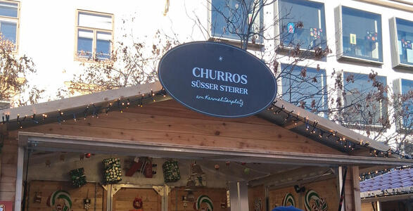 Christmas market stand: Churros Süsser Steirer