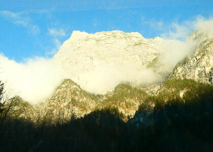 Mountain with cloud layer about halfway up