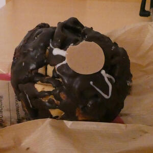 Big pastry with chocolate inside and chocolate covering