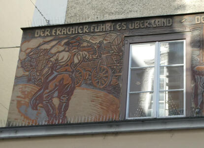 Painting of man driving a wagon. „Der Frächter führt es überland“