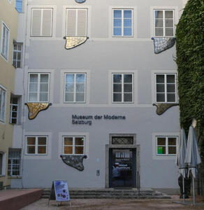 Museum der Moderne, with irregular shaped metal “blobs” on the wall.