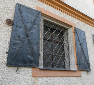 Open metal window shutters.