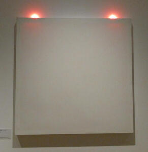 Blank canvas with two “hanger hooks” at top, which are lit in neon pink.