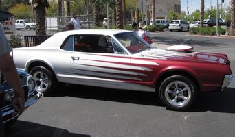 white/red car with air scoop on hood