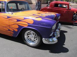 side view of purple/yellow car