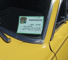 Card on windshield reading “Mustang: Valentine from WIFE!”