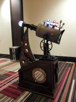 Telescope-like sculpture that looks as if it came from a Jules Verne novel