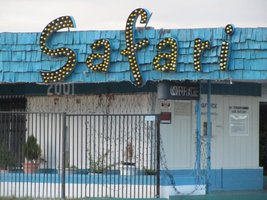 Script lettering, yellow incandescent bulbs