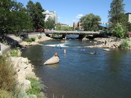 long view of river with bridge in background