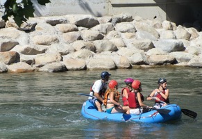 People in blue raft