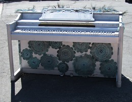 Piano painted with mandalas