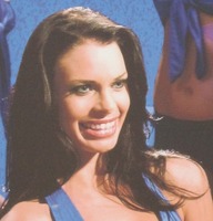woman with frozen smile on her face