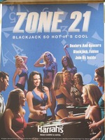 Advert showing nubile women dancing and dealing cards