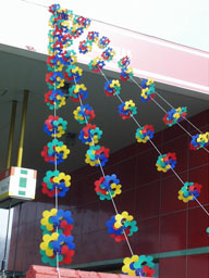 Whirligigs at gas station 