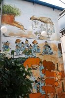 Painting on outside wall of restaurant