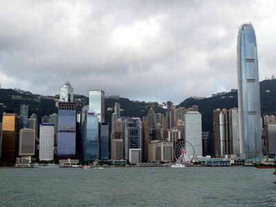 Harbor skyline; large Ferris Wheel at lower mid-right