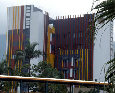 Building with vertical brown and yellow striping