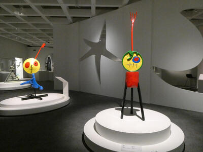 two multicolored statues