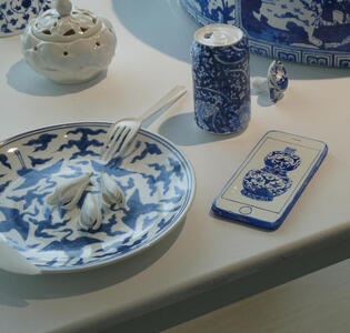 plate fork soda can and cell phone