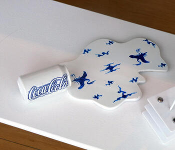 soda can with porcelain spill