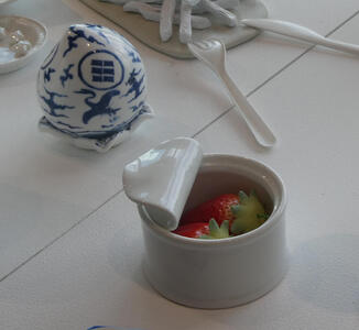 zip top can with strawberries inside