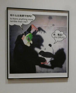 Man in demon mask holding panda toy; asks Is there anything more terrible than me; panda says “It’s DRUG!”
