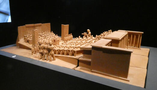 small figurines in auditorium