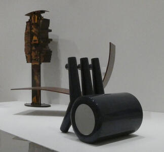 chair with large cylindrical base as seat