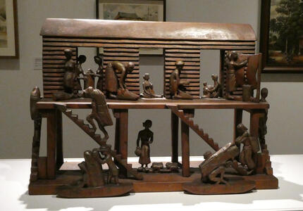 wooden longhouse sculpture