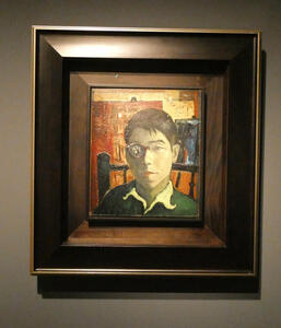 man with half eyeglasses