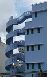 light blue circular spiral staircase