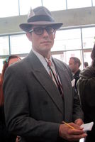 Man dressed as Clark Kent