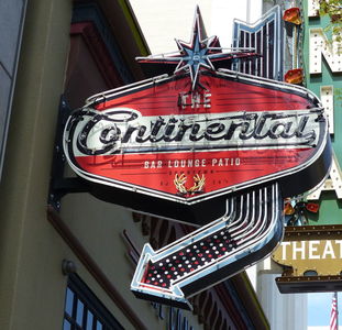 old-style neon sign with start at top and arrow at bottom