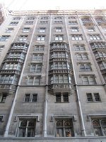 Facade of 10-story building at steep upward angle