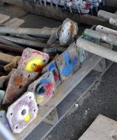 Metal pipes with paint on bottom stand