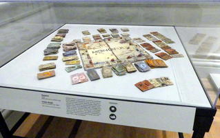 Monopoly set painted on unfired clay.