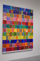 Panel with multi-colored letters “Master of the universe, top dog, head honcho, king of the hill, numero uno, the big enchilada, the boss, the deceder, rule with an iron hand, gotcha by the balls”