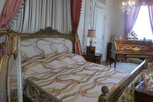 Bed with flower design bedspread