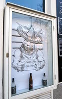 Rabbit in sombrero holding sign reading “Falshcer Hase Santa Muerte”