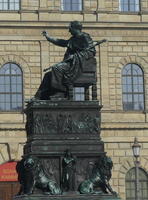 Bronze monument with seated figure