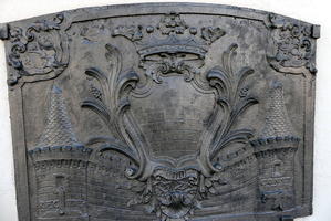 Royal crest with castle in background